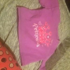 A little girls hanes sweater its purple and the size is 24 months.